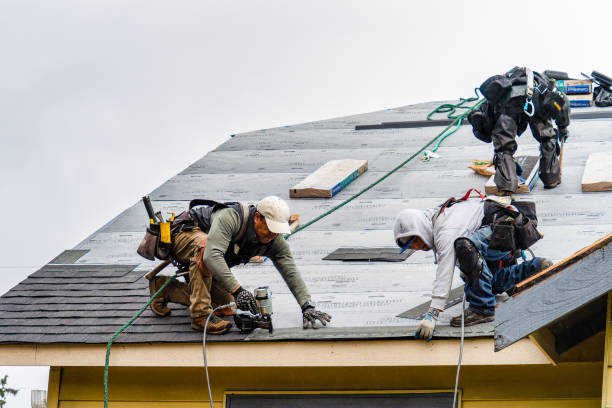 Professional Gutter Installation technician working in Hayes, VA